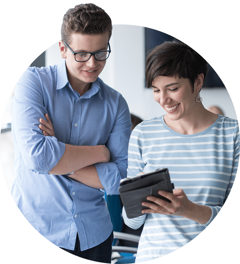 Man and women looking at tablet